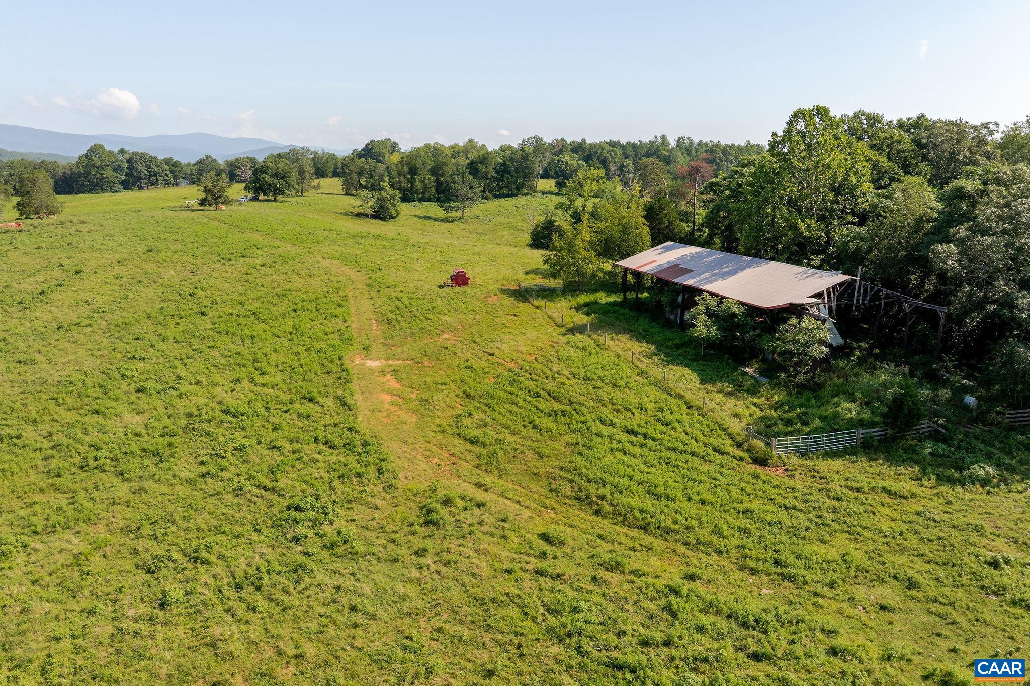 955 Simmons Gap Road Dyke, VA 22935 - Photo 28 of 33 a view of a lake from a yard