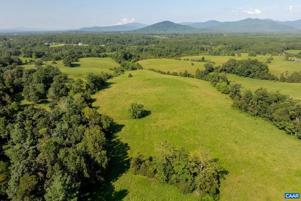 a view of a lake with a mountain