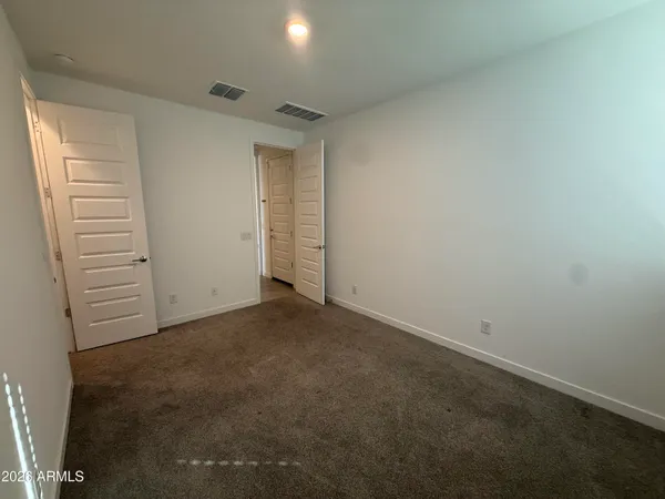 an empty room with closet