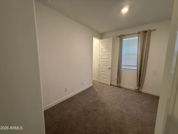 an empty room with closet
