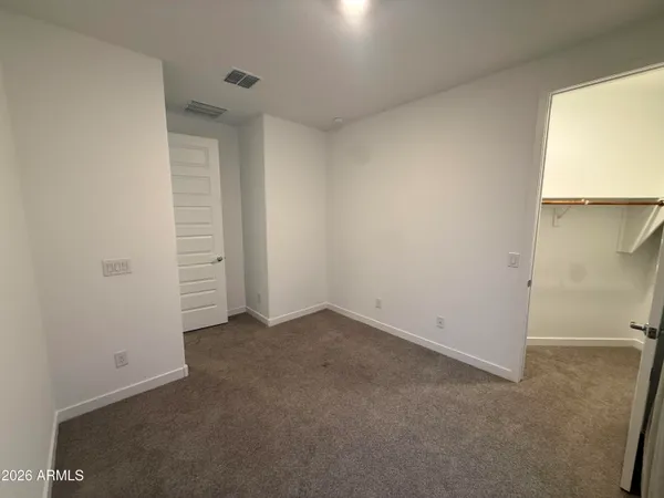 an empty room with closet