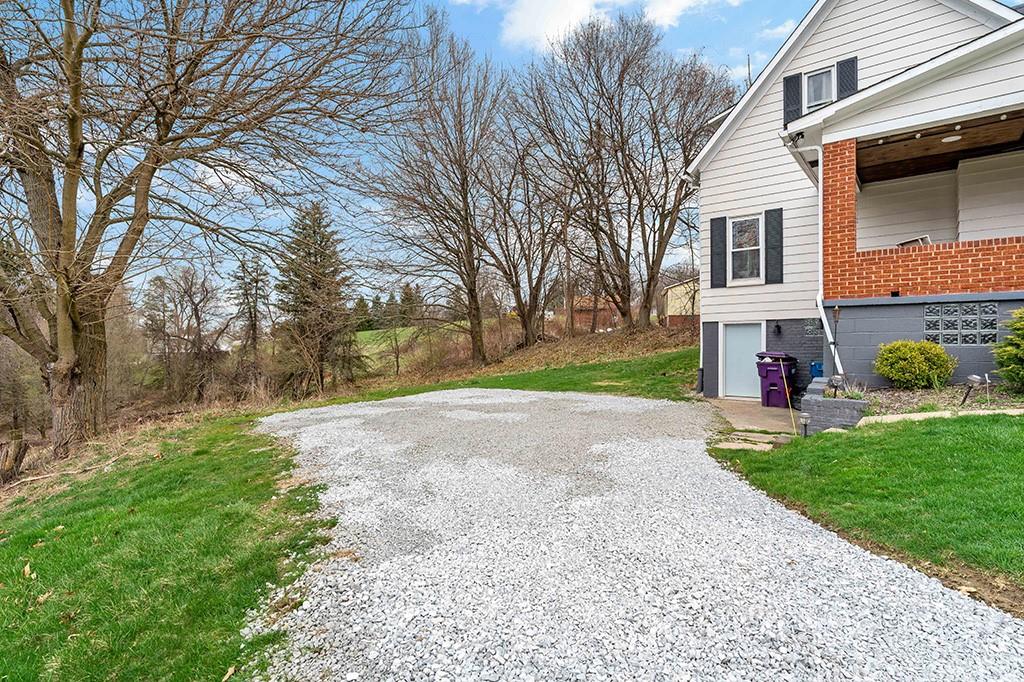 231 Scott Road Pittsburgh, PA 15239 - Photo 23 of 30 a view of a yard in front of a house