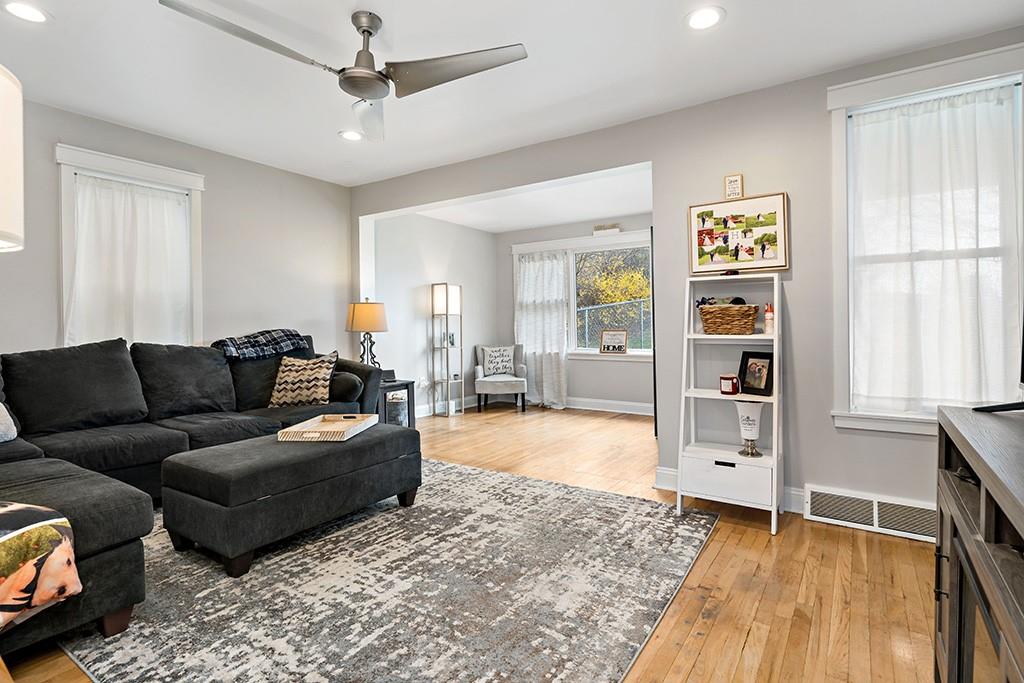 231 Scott Road Pittsburgh, PA 15239 - Photo 4 of 30 a living room with furniture and a wooden floor