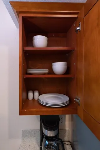 a bathroom with a toilet a sink and a mirror