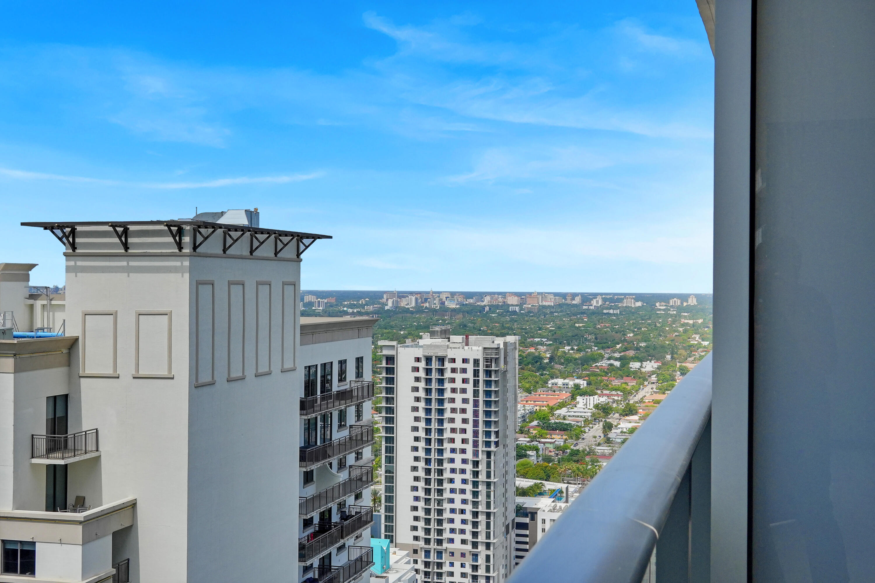 55 Southwest 9th Street, Unit 3504 Miami, FL 33130 - Photo 17 of 33 a view of a balcony with an ocean view