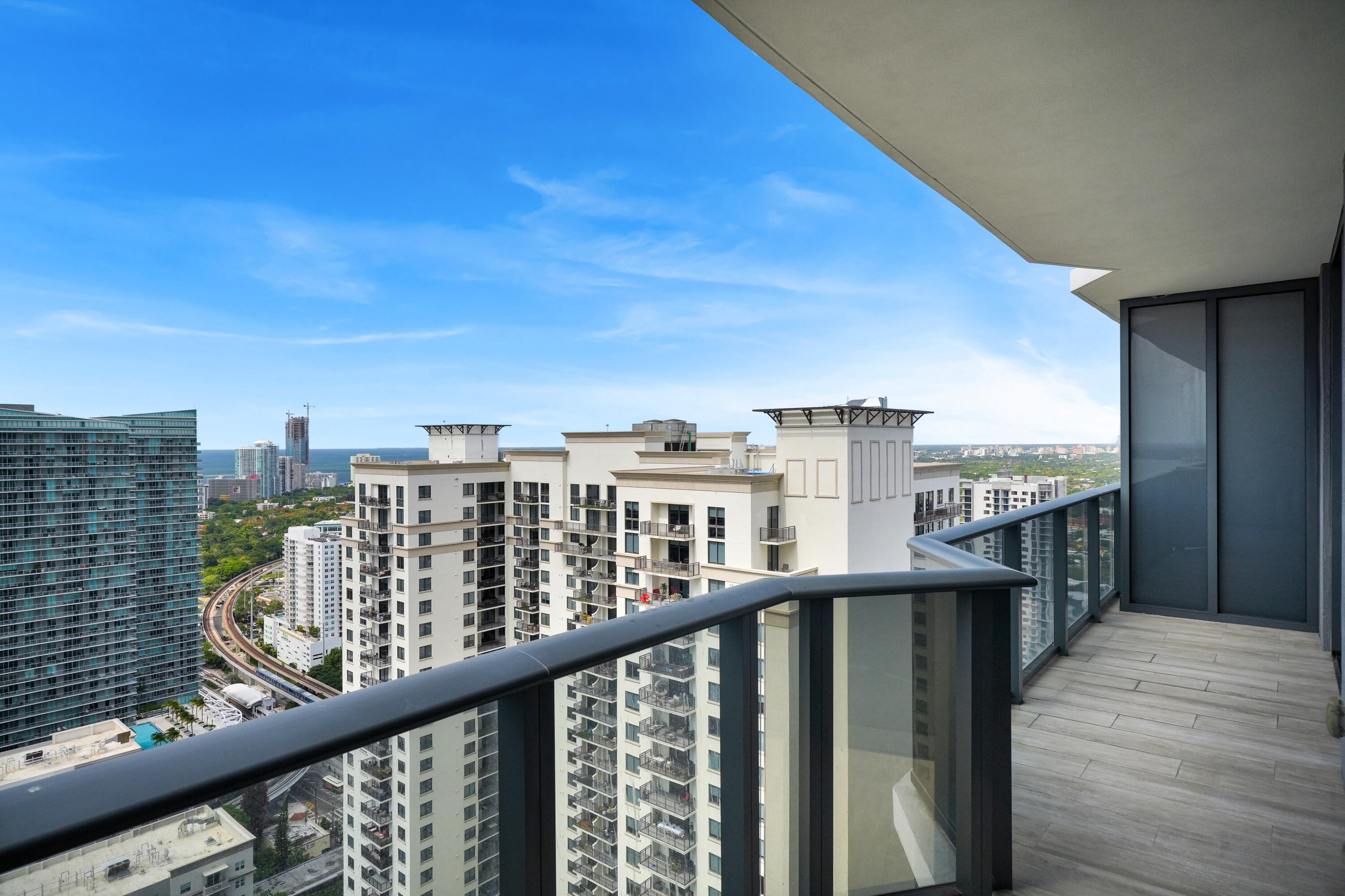 55 Southwest 9th Street, Unit 3504 Miami, FL 33130 - Photo 18 of 33 a view of a balcony with city view
