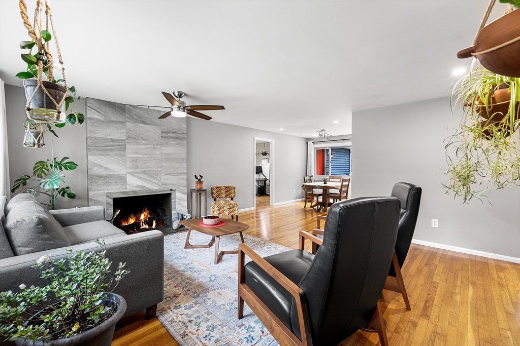 10 Livoli Road Framingham, MA 01701 - Photo 4 of 36 a living room with furniture and a fireplace