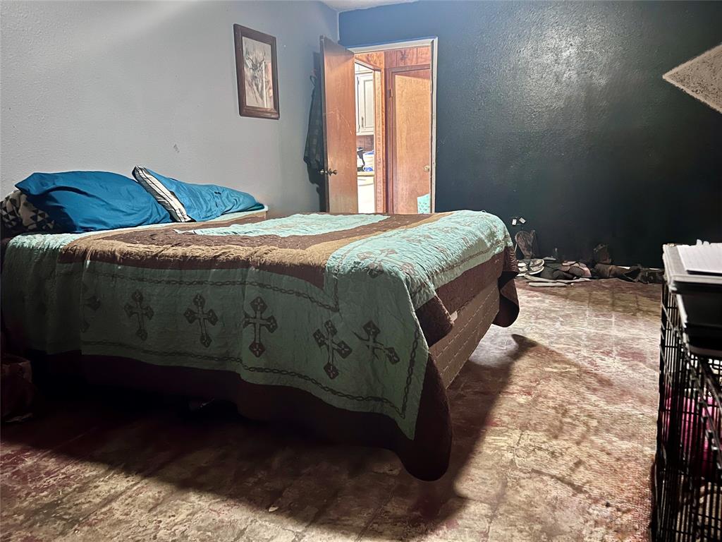 5193 County Road Blossom, TX 75416 - Photo 14 of 15 a bedroom with a bed and a window