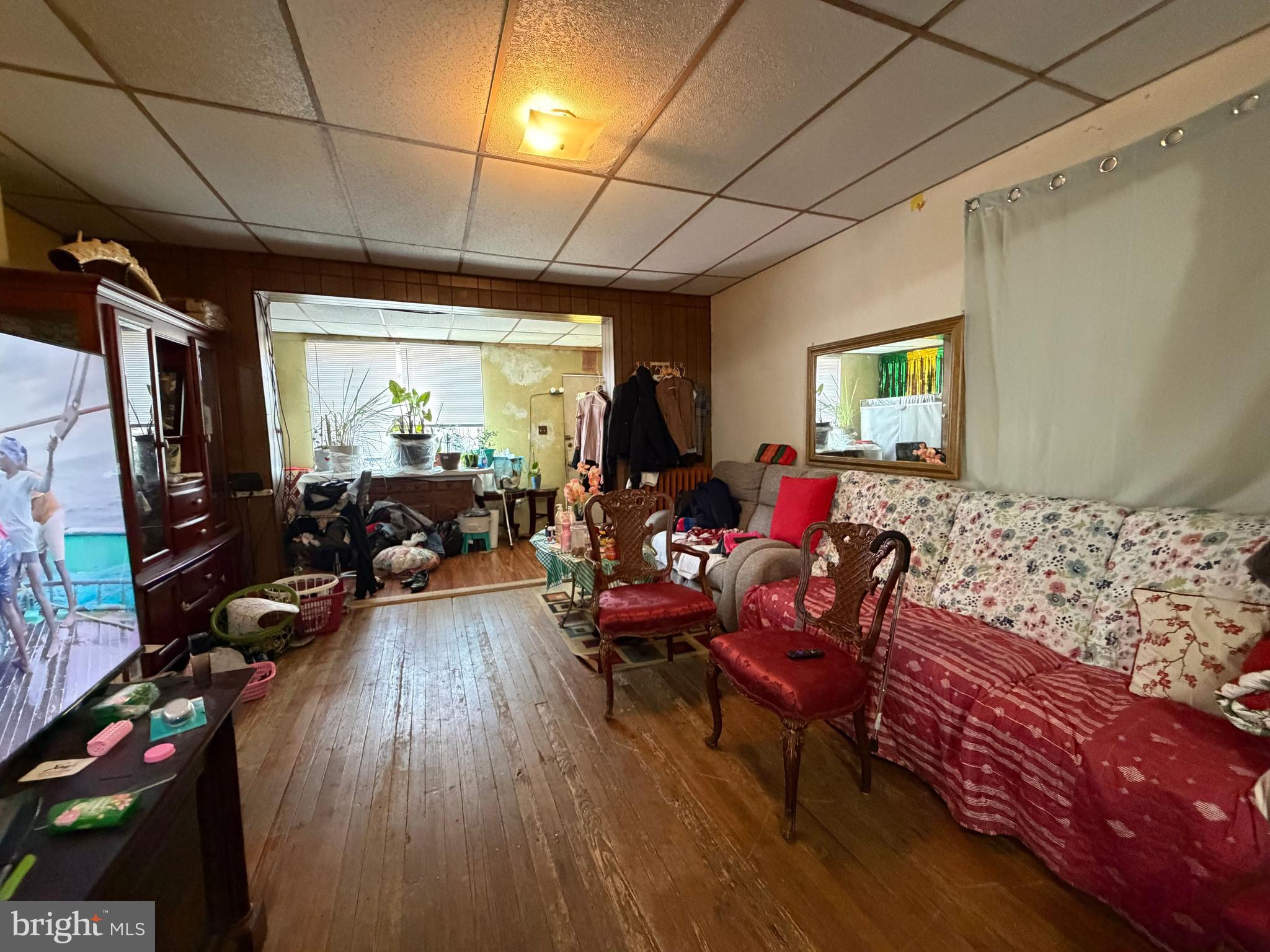 2033 South Bonsall Street Philadelphia, PA 19145 - Photo 8 of 31 a living room with furniture and a flat screen tv
