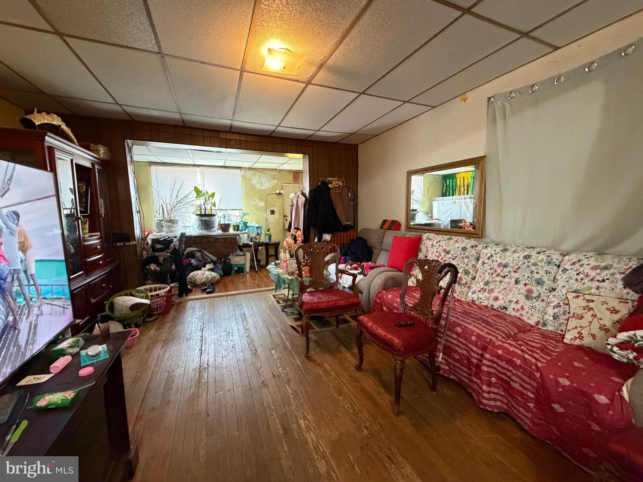 2033 South Bonsall Street Philadelphia, PA 19145 - Photo 9 of 31 a living room with furniture and a flat screen tv