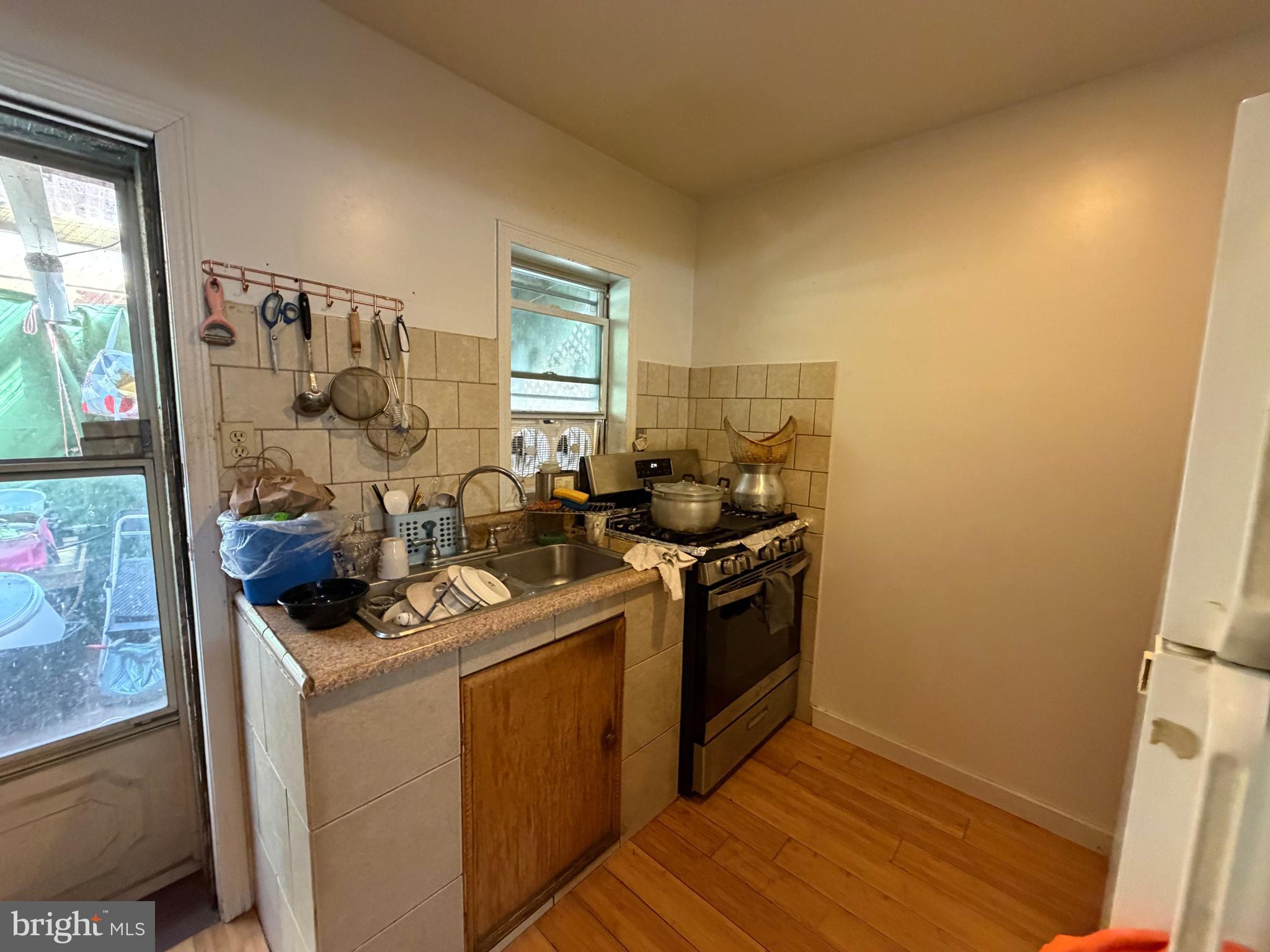 2033 South Bonsall Street Philadelphia, PA 19145 - Photo 10 of 31 a room with storage and utility