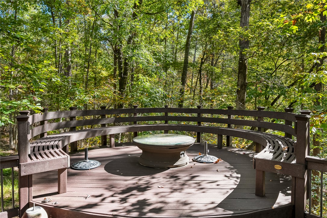 28 Quail Drive Salem, SC 29676 - Photo 33 of 47 Elevated circular seating surrounding gas firepit.