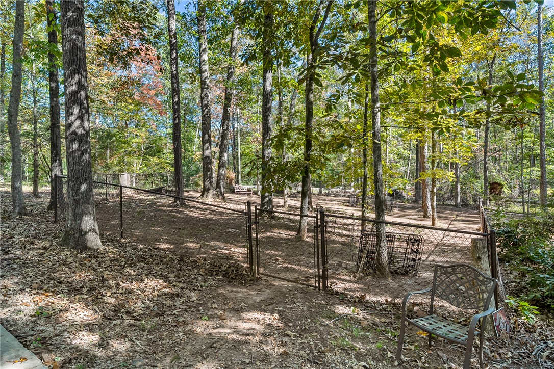 28 Quail Drive Salem, SC 29676 - Photo 37 of 47 partially fenced yard, great for exercising dogs.