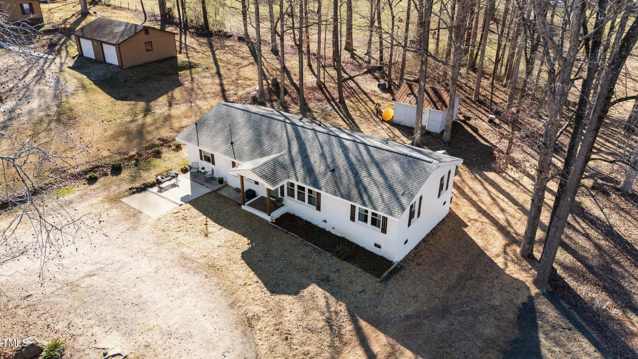 4775 Barber Mill Road Clayton, NC 27520 - Photo 17 of 54 a view of a back yard of the house