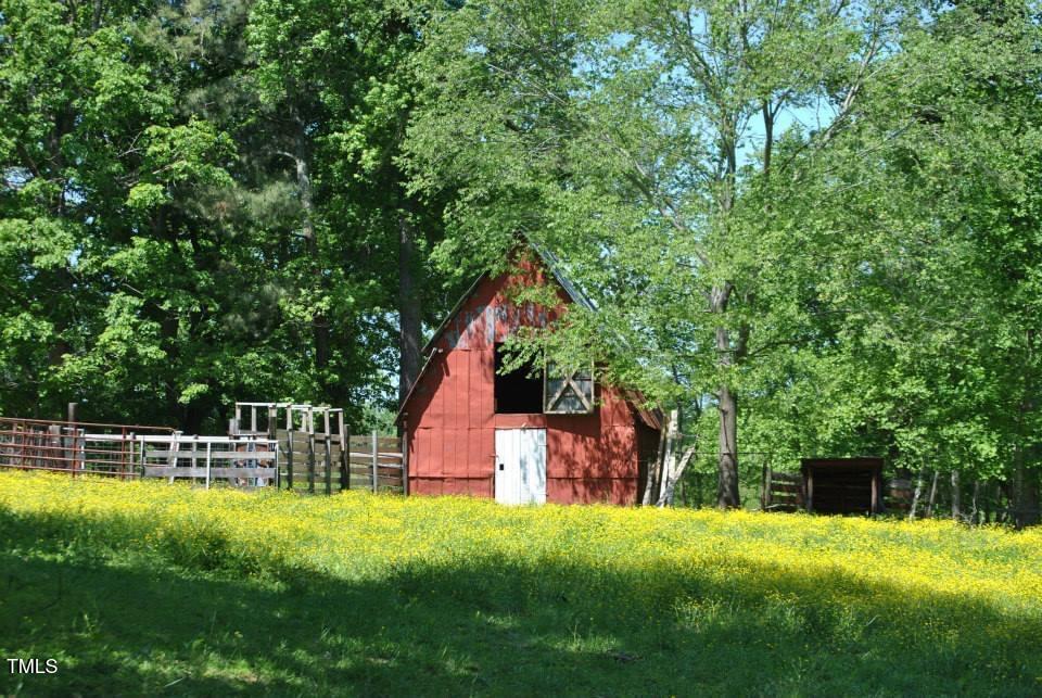 4775 Barber Mill Road Clayton, NC 27520 - Photo 54 of 54 a view of a house with a backyard