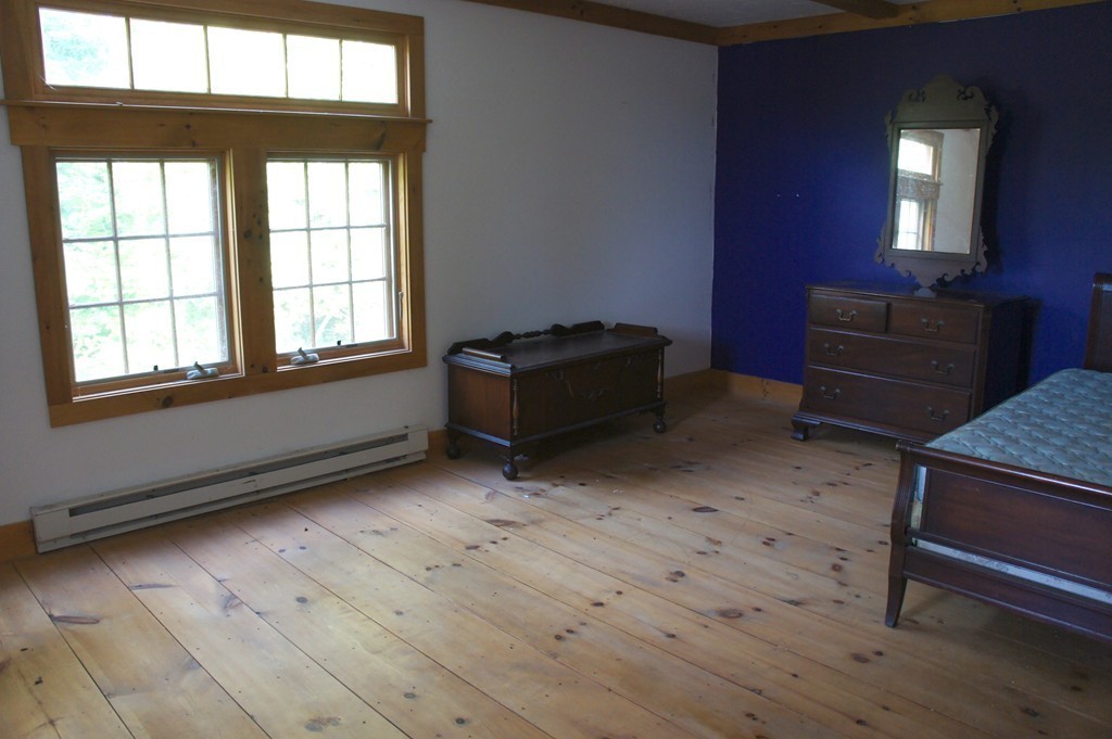176 Crouch Road Warren, MA 01092 - Photo 15 of 19 a living room with furniture and a window