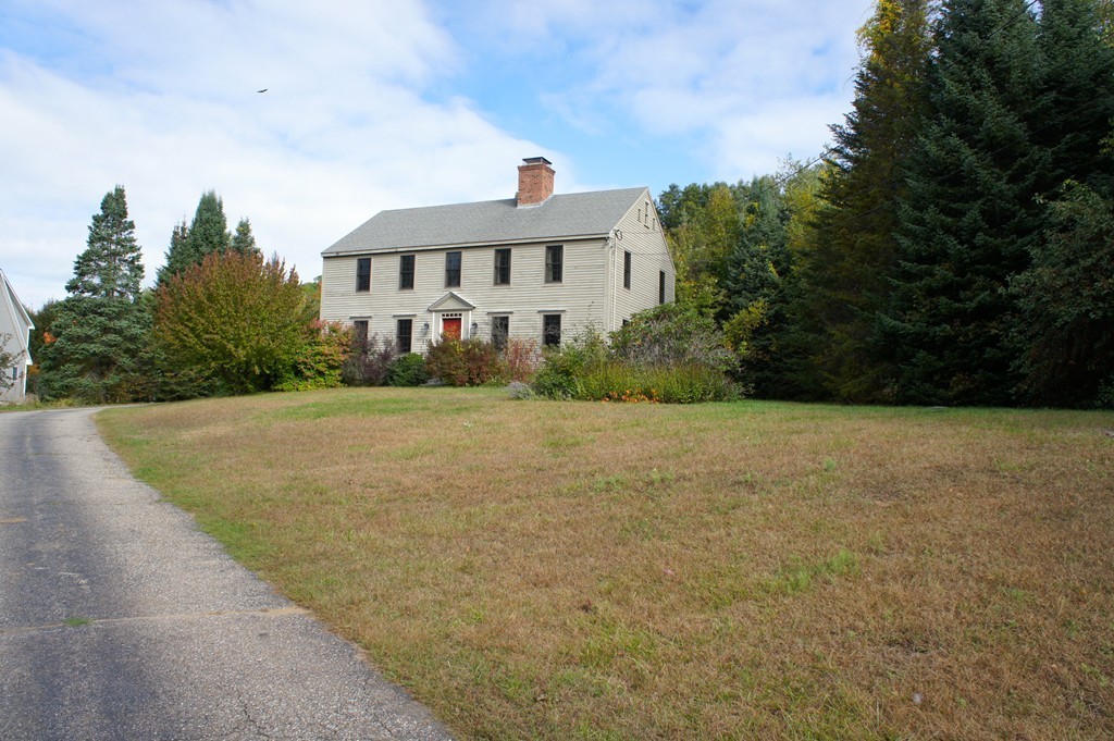 176 Crouch Road Warren, MA 01092 - Photo 19 of 19 a front view of house with yard and green space