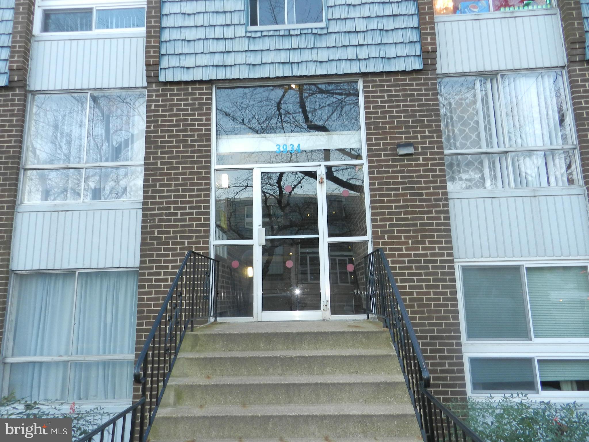 3934 Bel Pre Road, Unit 2 Silver Spring, MD 20906 - Photo 1 of 11 a front view of a house with a window