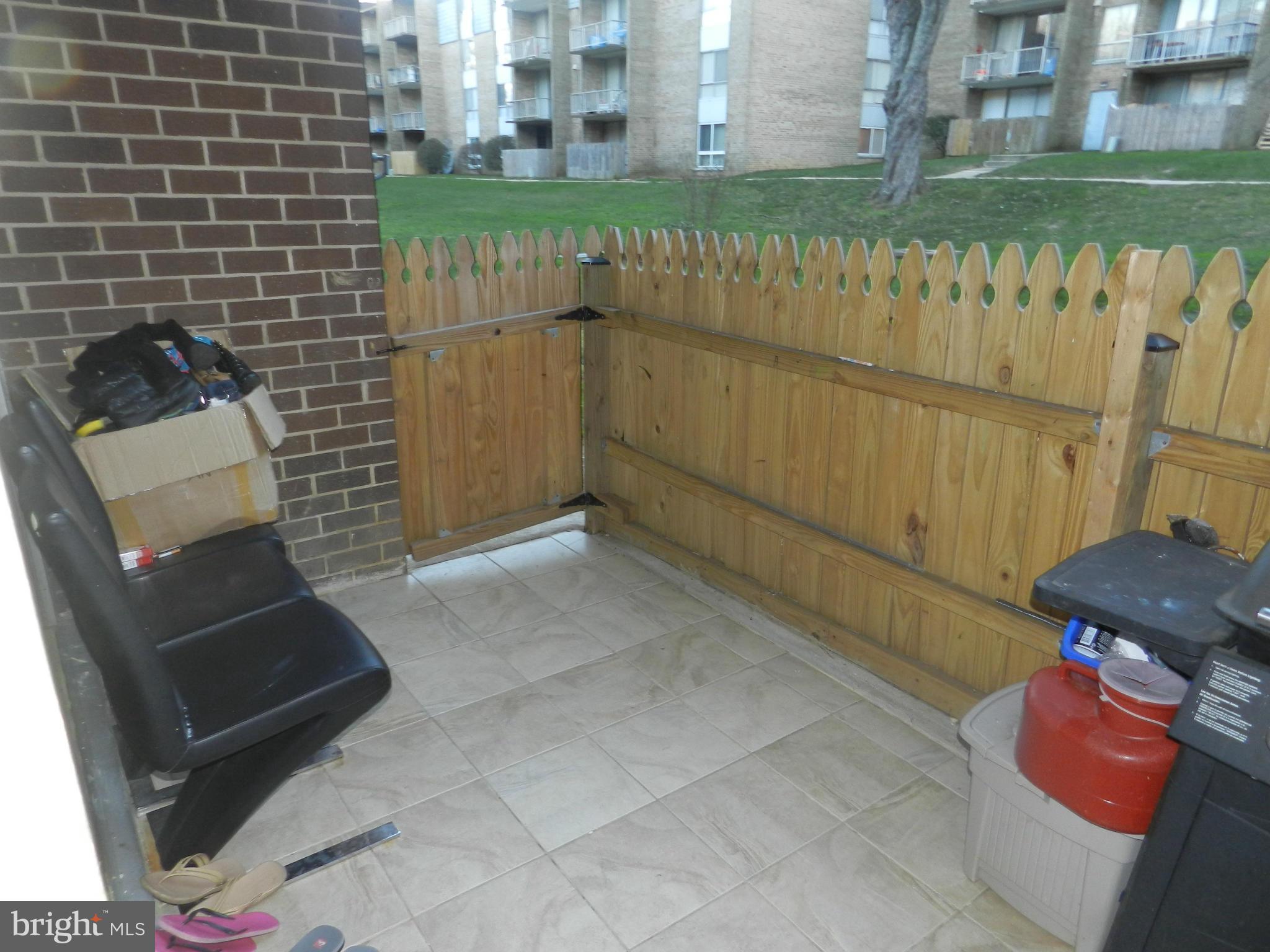 3934 Bel Pre Road, Unit 2 Silver Spring, MD 20906 - Photo 3 of 11 a view of a bench in balcony