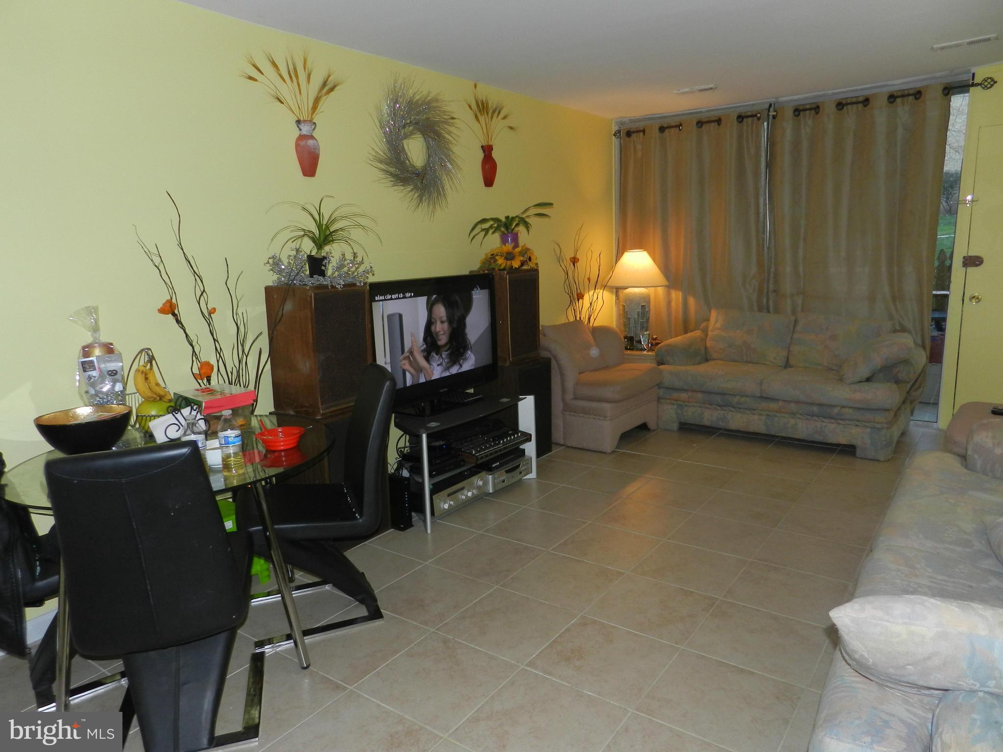 3934 Bel Pre Road, Unit 2 Silver Spring, MD 20906 - Photo 4 of 11 a room with furniture and walls