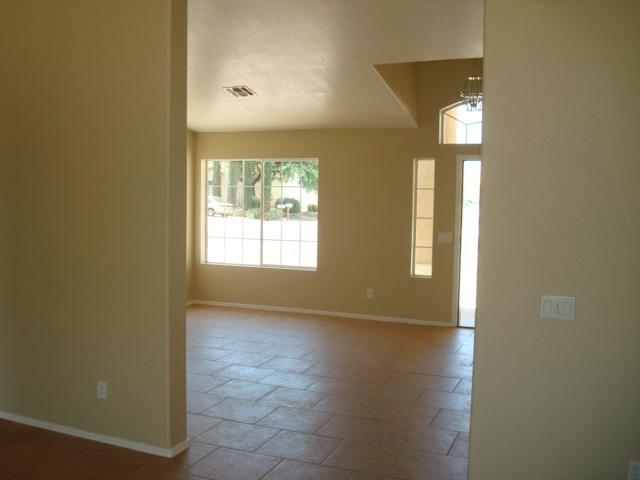 2202 East Ranch Court Gilbert, AZ 85296 - Photo 8 of 10 tiled living room area