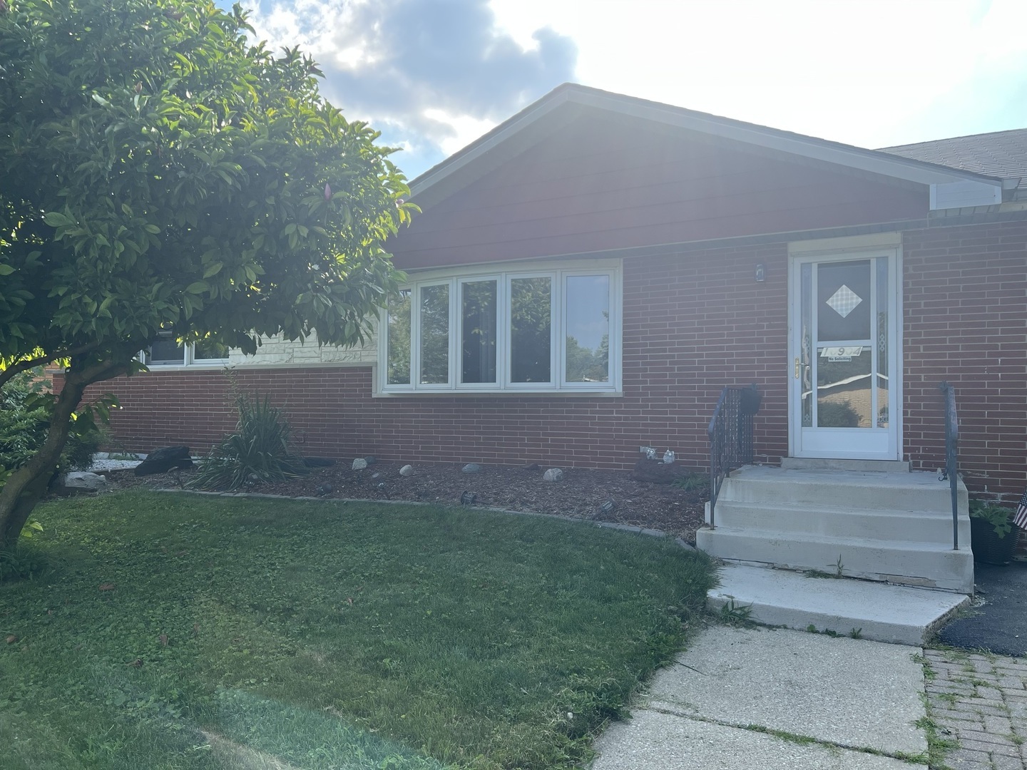 10904 Rutherford Avenue Worth, IL 60482 - Photo 1 of 14 a view of a house with a yard