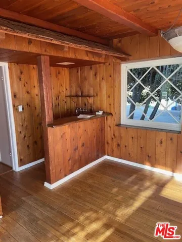 a couple of chairs in front of door