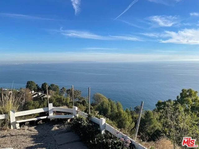 a view of a lake and mountain in the back