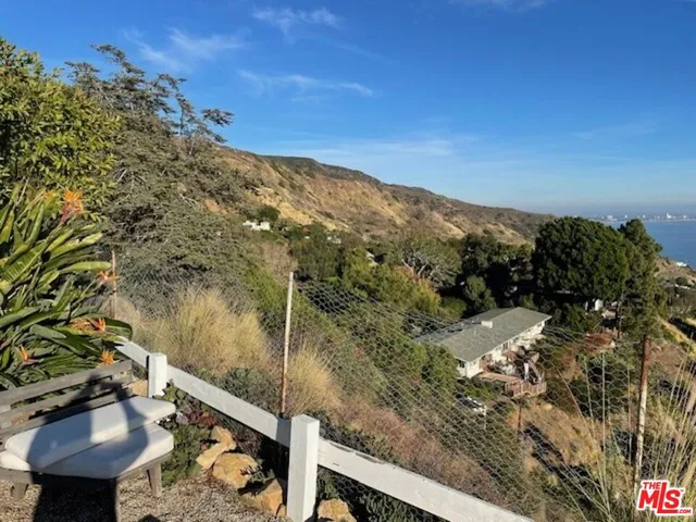 a large bathroom with a sink and a large mirror