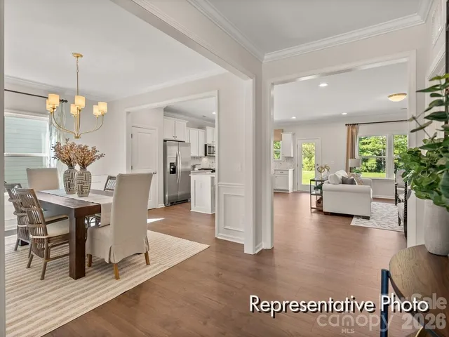 a view of a livingroom with furniture and a table