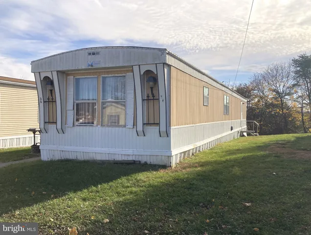 a front view of house with yard