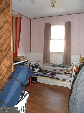 a room with furniture and window