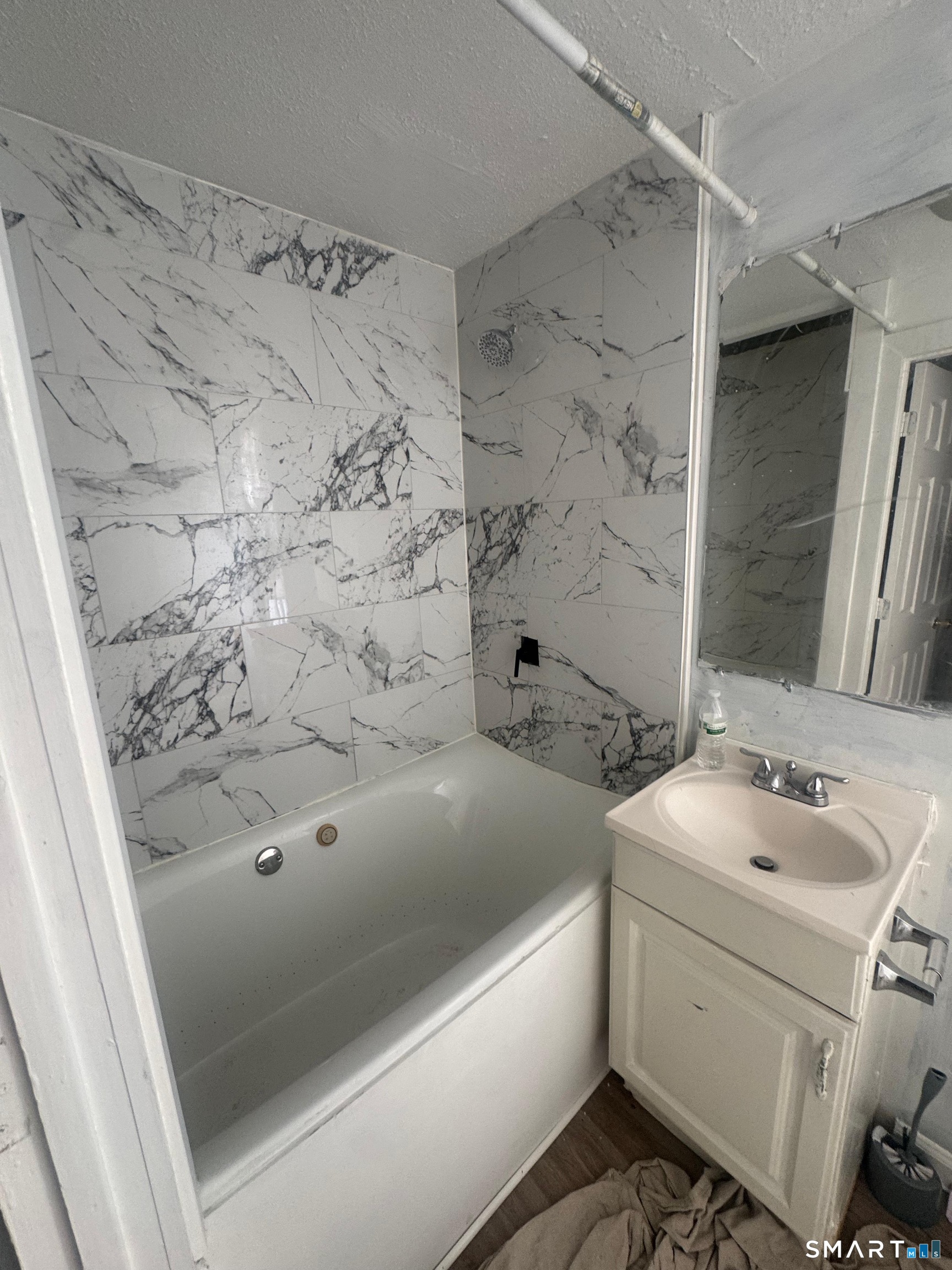 7 Armstrong Place Bridgeport, CT 06608 - Photo 9 of 9 a bathroom with a sink and a bathtub