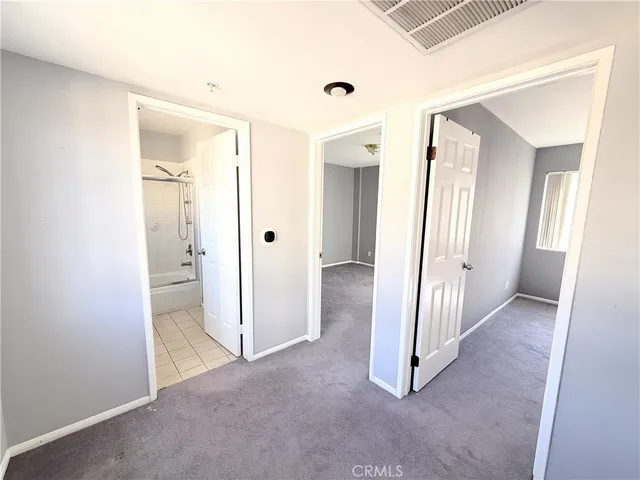 a view of livingroom with hardwood floor and a ceiling fan