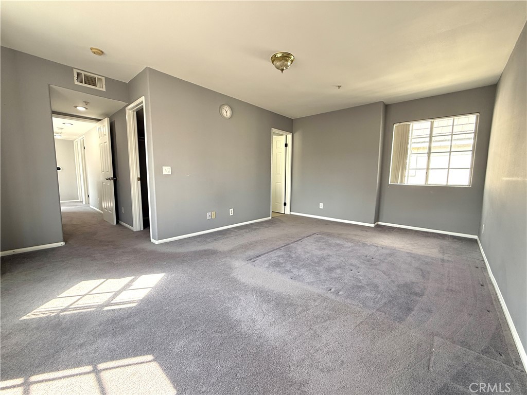 1230 Elm Avenue, Unit G San Gabriel, CA 91775 - Photo 25 of 33 a view of livingroom with an empty space and windows