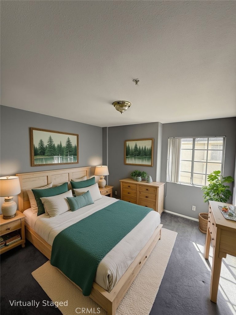 1230 Elm Avenue, Unit G San Gabriel, CA 91775 - Photo 27 of 33 a bedroom with furniture and a large window