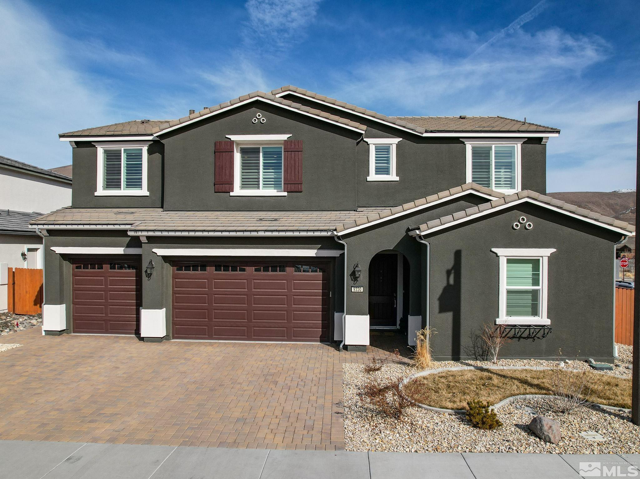 9330 Mayfair Way Reno, NV 89521 - Photo 1 of 40 a front view of a house