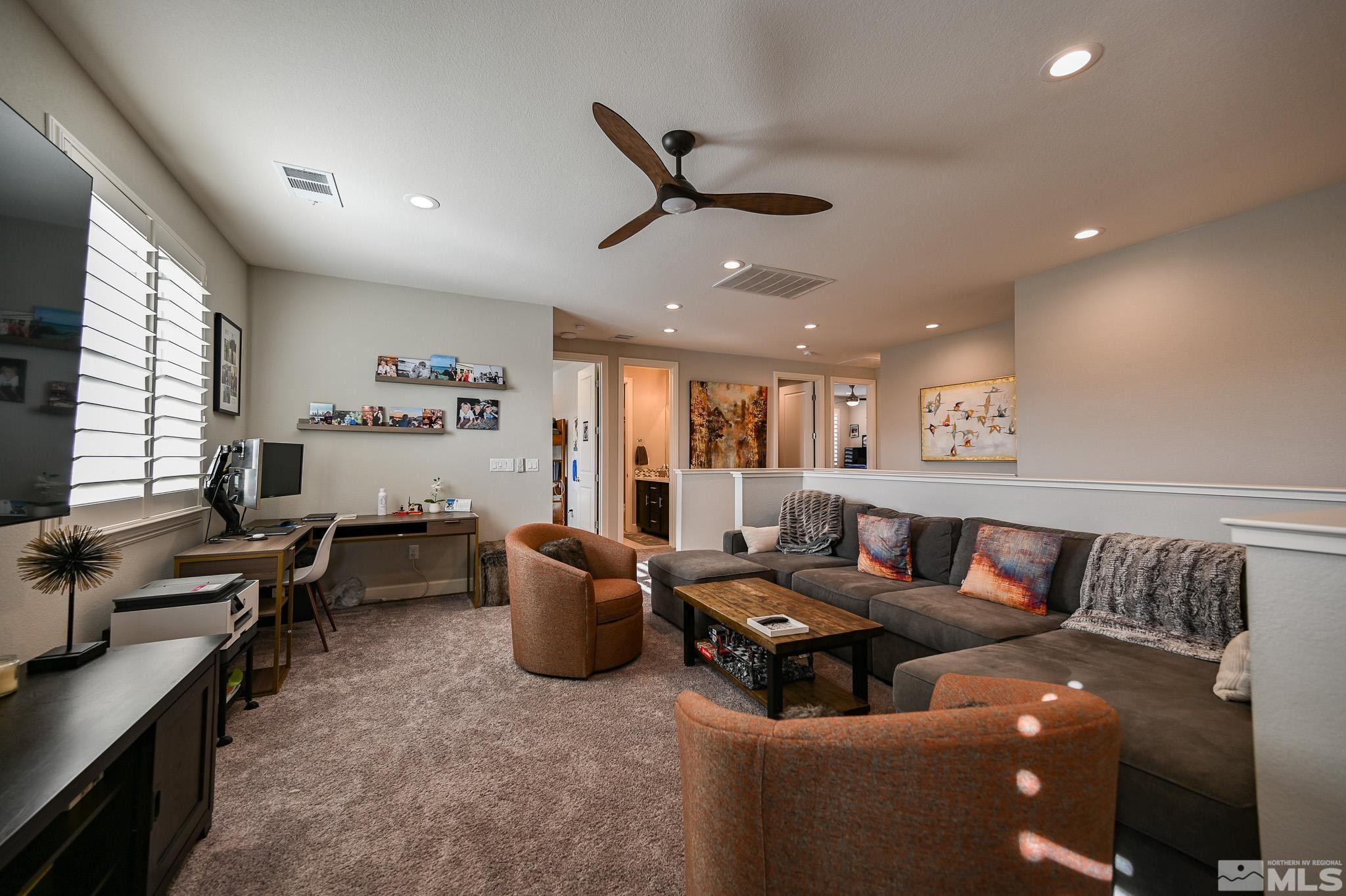 9330 Mayfair Way Reno, NV 89521 - Photo 17 of 40 a living room with furniture and a window