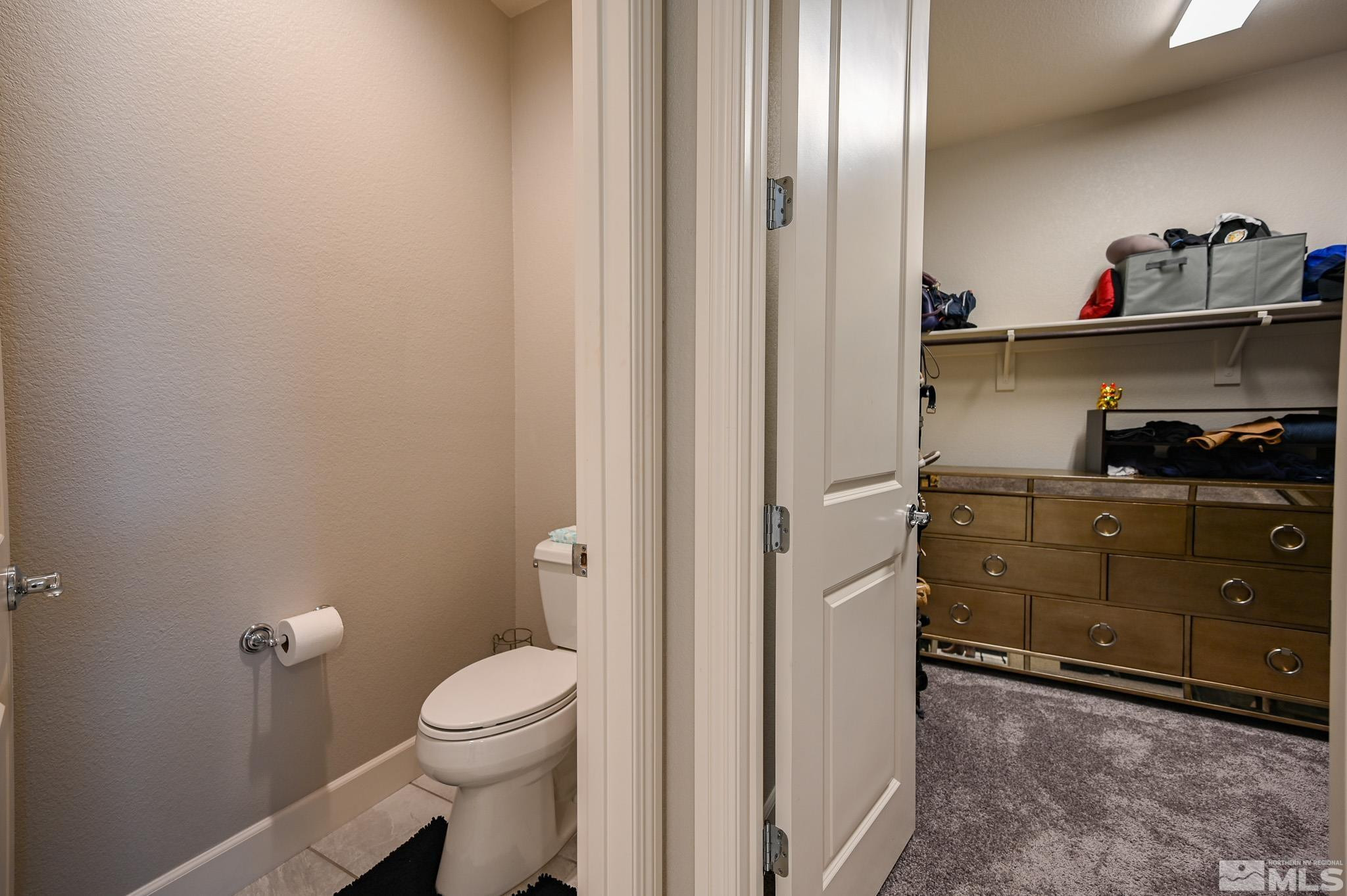 9330 Mayfair Way Reno, NV 89521 - Photo 34 of 40 a bathroom with a toilet and a shower