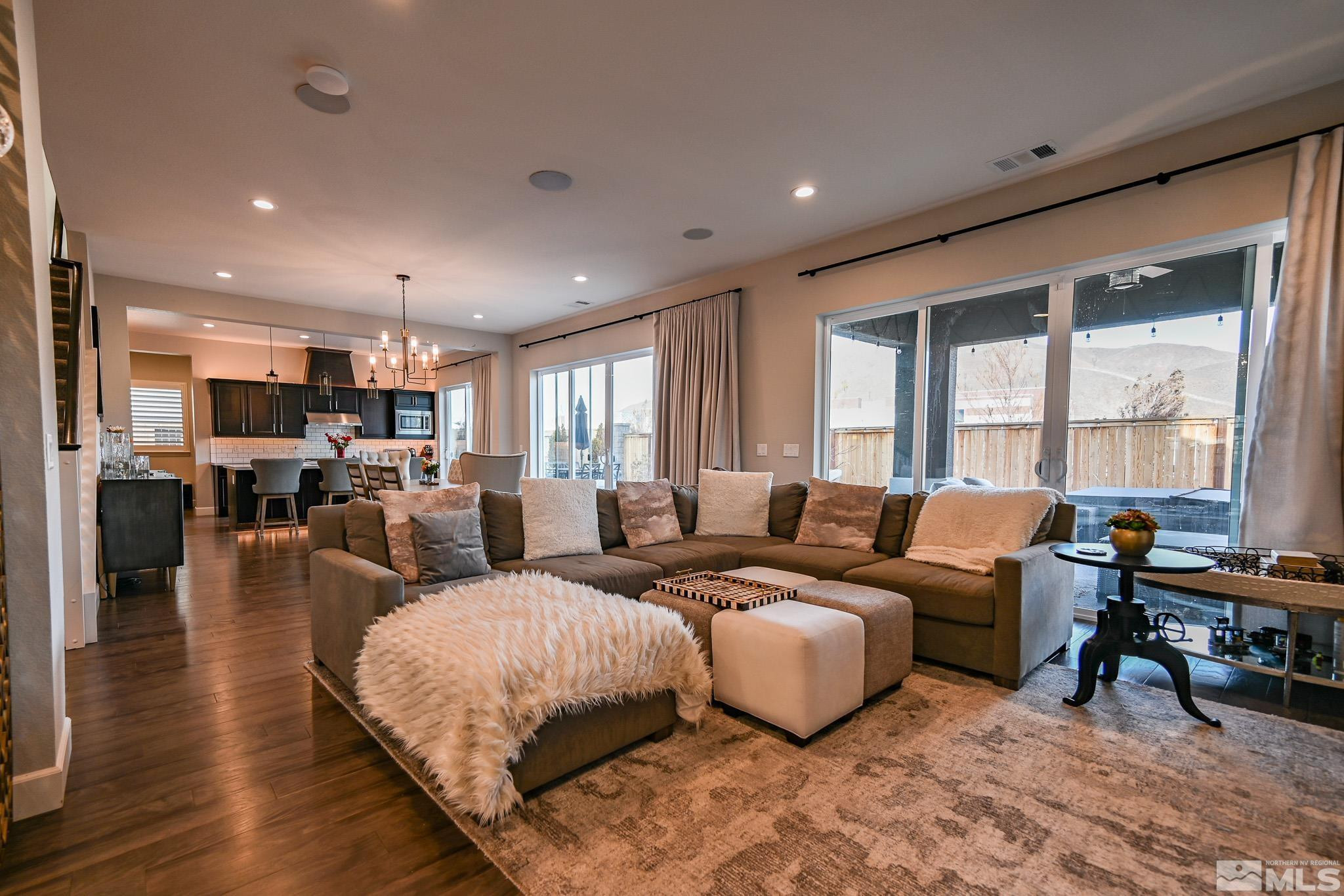 9330 Mayfair Way Reno, NV 89521 - Photo 6 of 40 a living room with furniture and a large window