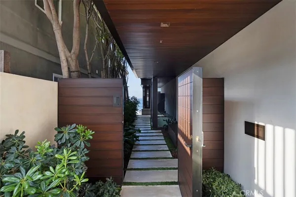 a view of balcony with wooden floor