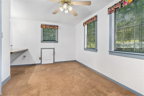 an empty room with windows