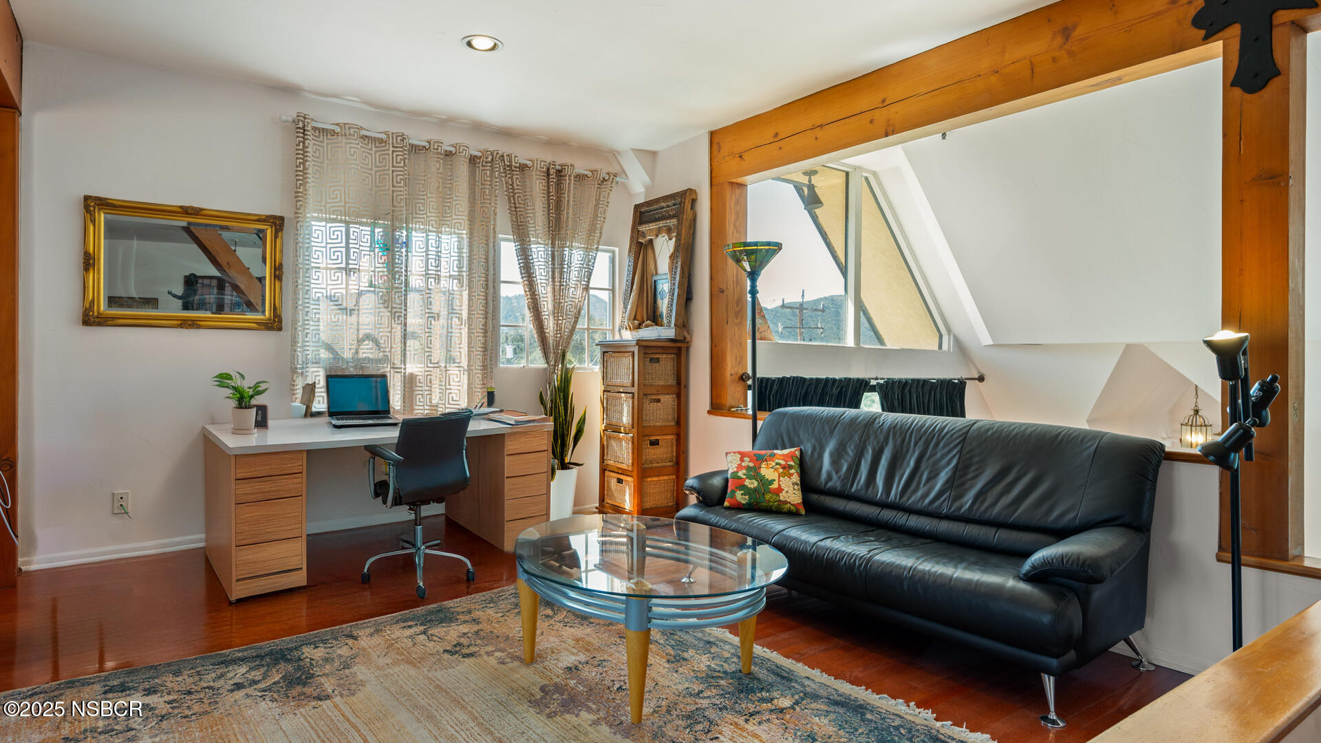437 2nd Street Solvang, CA 93463 - Photo 27 of 39 a living room with furniture and a large window