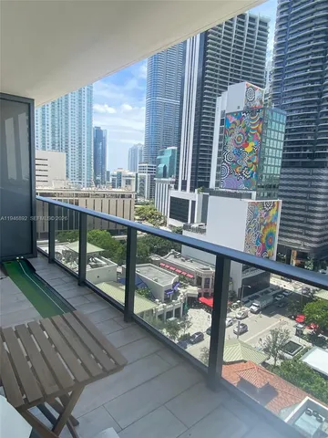 a view of a balcony with an outdoor space