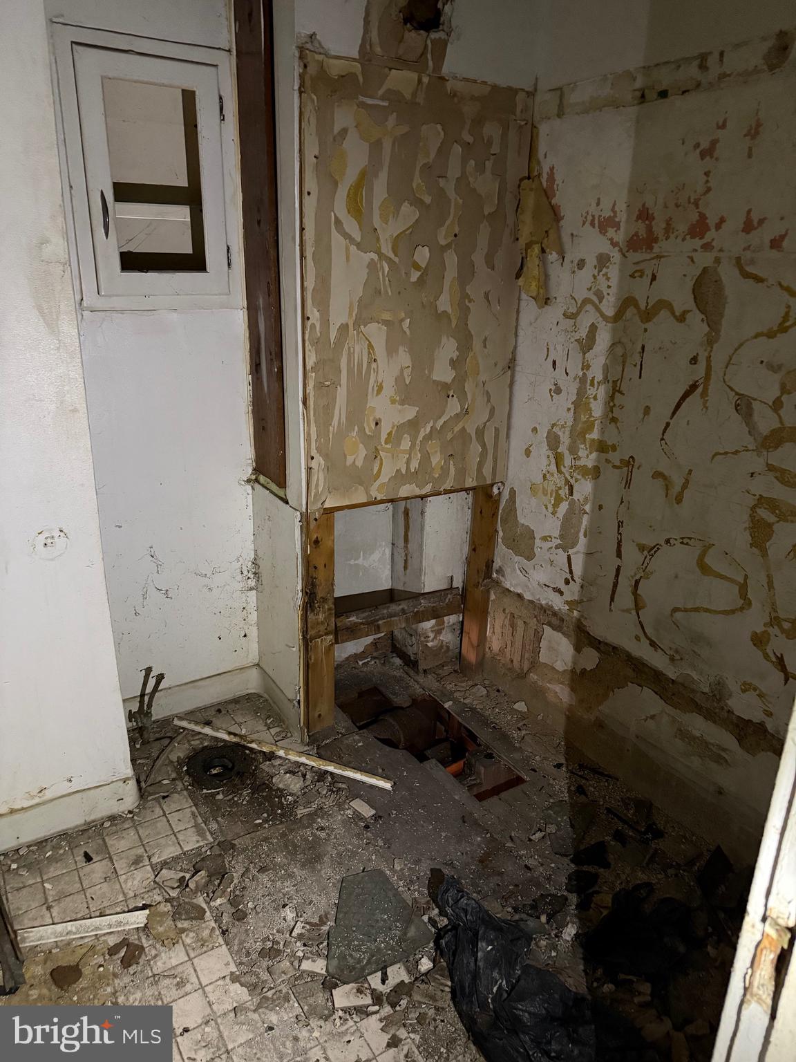 1119 Brown Street Chester, PA 19013 - Photo 11 of 18 a bathroom with a sink toilet and shower