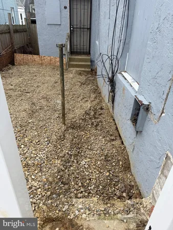 a view of a backyard of the house