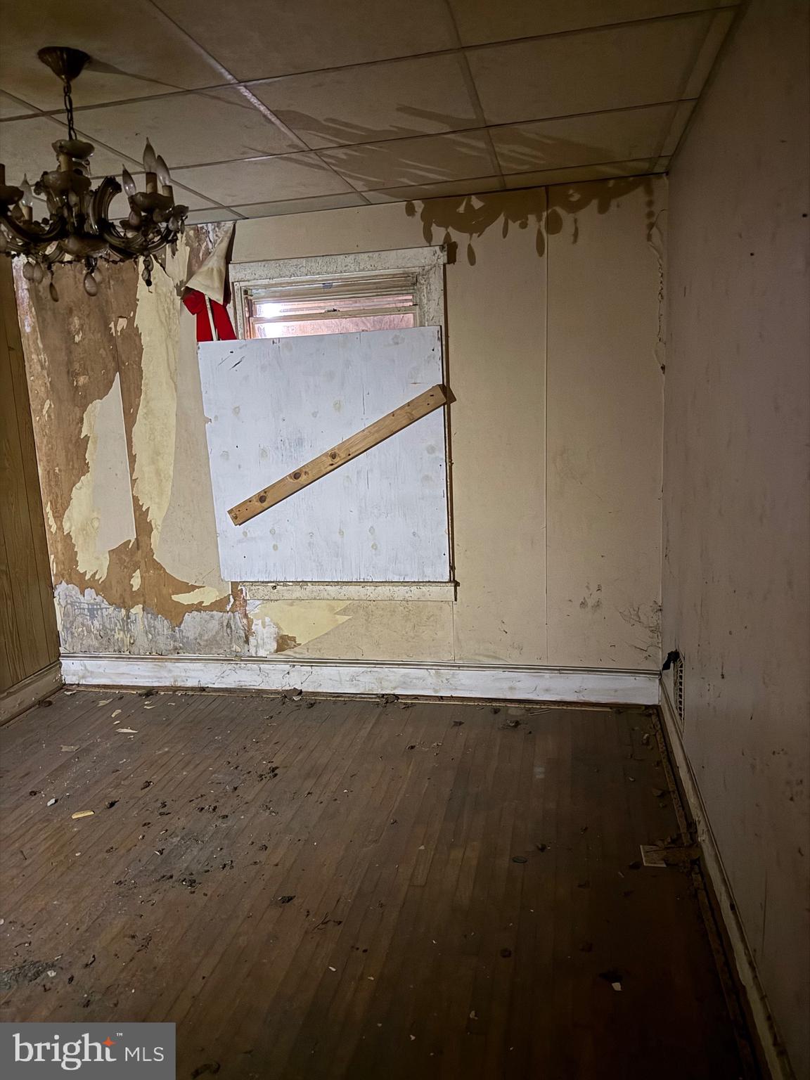 1119 Brown Street Chester, PA 19013 - Photo 7 of 18 a view of a room with wooden floor