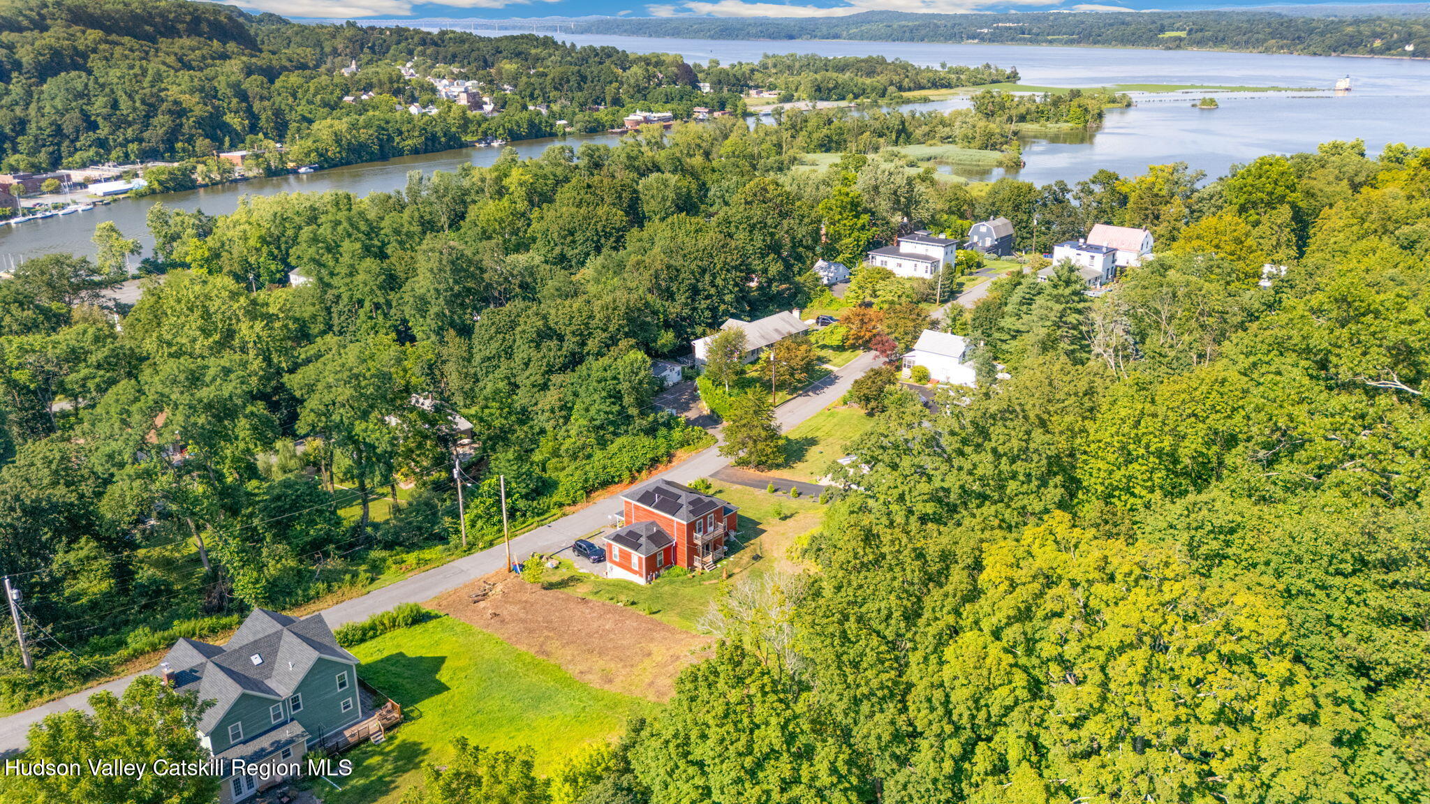 635 Third Avenue Port Ewen, NY 12466 - Photo 9 of 9 an aerial view of a residential houses with outdoor space and trees all around