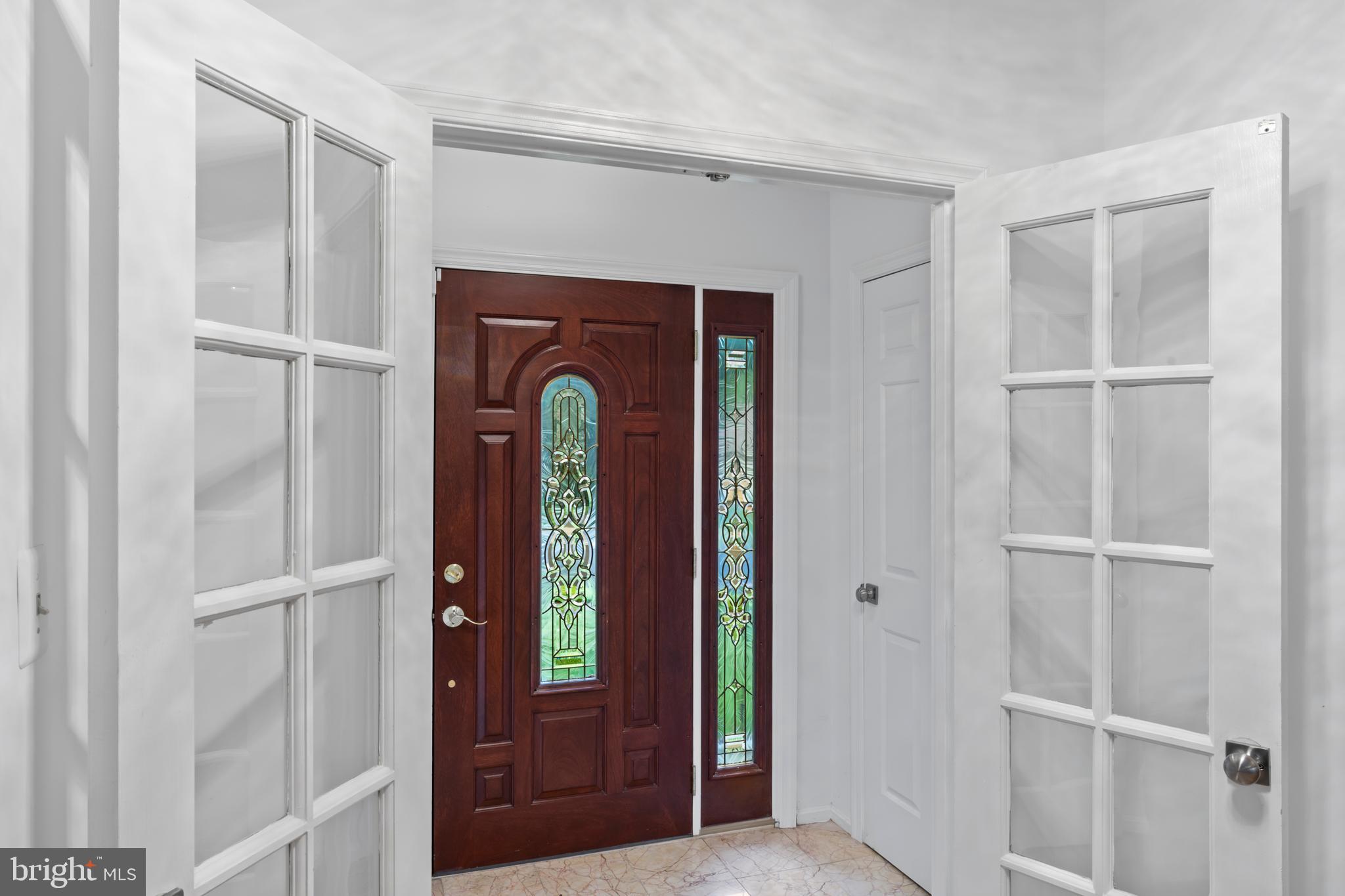 1950 Weybridge Lane Reston, VA 20191 - Photo 11 of 71 a view of front door with hallway