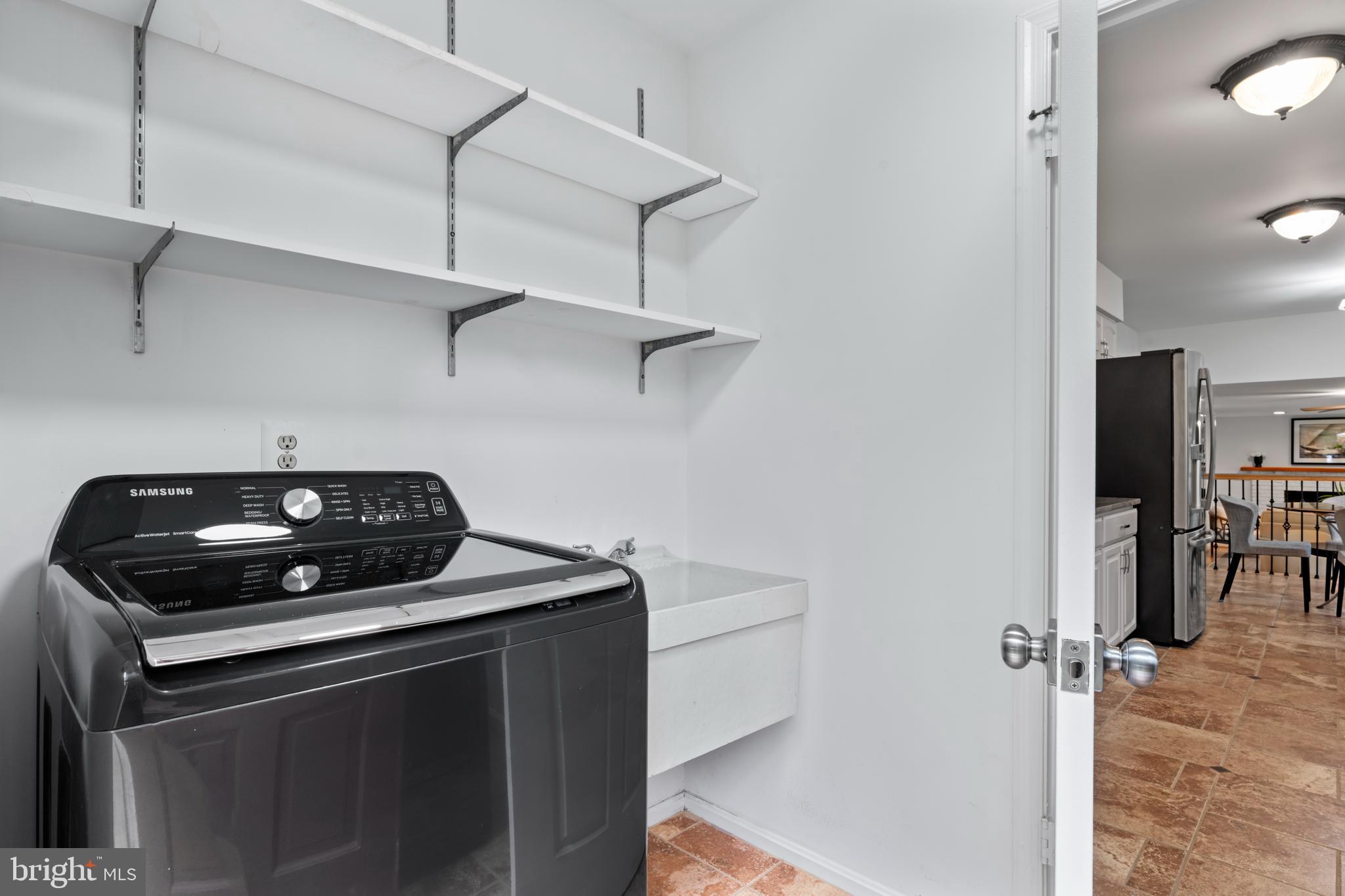 1950 Weybridge Lane Reston, VA 20191 - Photo 19 of 71 a kitchen with a stove and a refrigerator
